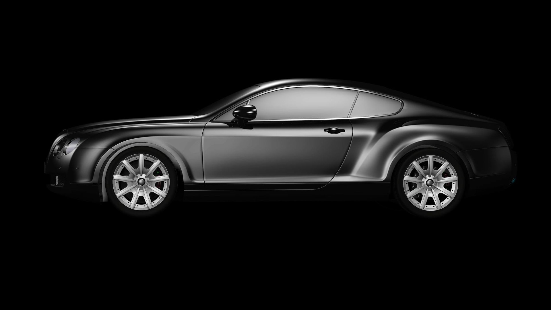 Premium black coupe on dark studio backdrop — Shiney Auto Detailing